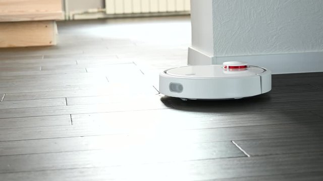 Robot vacuum cleaner cleans the floor 