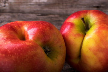 Concept of ugly food - red apple on background