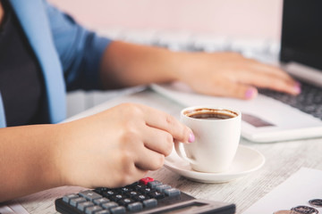 woman hand coffee with computer keyboard