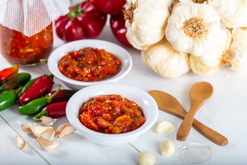 Chemen sauce in bowl with vegetables.