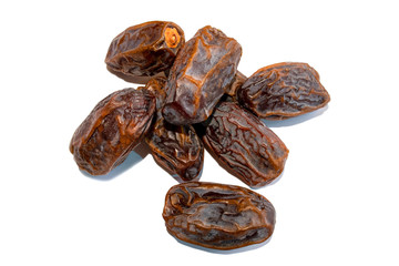 Dates. Fresh arabic dates isolated on white background. Date palm fruit. Pile of dates. Top view. 
