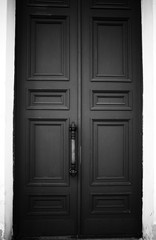 Closed black and white door architecture background