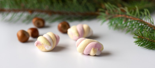 Marshmallows with christmas tree branch