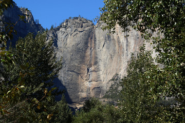Fototapeta na wymiar Yosemite waterfall goes dry every fall, after all of the snow melts & it still looks stunning less the sound of water hitting the canyon floor below