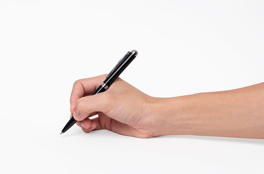 Hand Holding Pen Writing On White Background, Closeup.