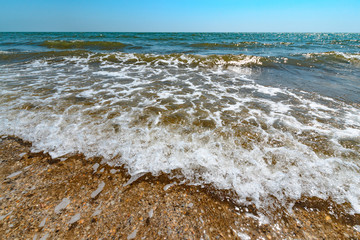 Sea view from tropical beach with sunny sky.