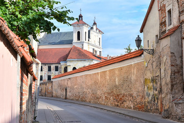 Lithuania, Vilnius - July 2019. Beautiful streets of the old city in Vilnius.  Vilnius architecture.  Pedestrian streets with colorful houses. Old town. lithuania architecture