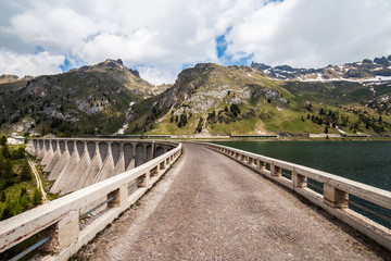 Lake Fedaia and dam at the foot of Marmolada mountain