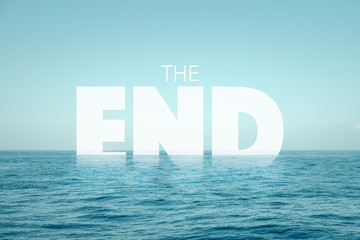 the end text in water with ocean background - climate change concept