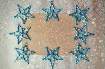 Christmas card. blue stars on a gray background. New year, Christmas. Grey.