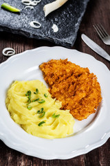 Chicken steak or schnitzel with mashed potatoes