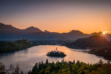Colorful landscape sunrise at Lake Bled with autumn foliage, Slovenia
