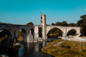 Fototapeta na wymiar Famous romanic bridge of Besalu town, Spain