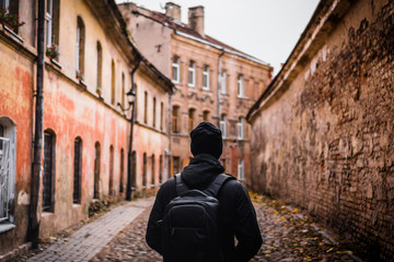 man walking at vilnius old town, lithuania