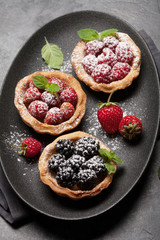 Set of cakes with berries