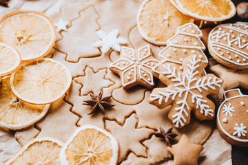 christmas homemade gingerbread cookies, spices and decorations, close up. Holiday, celebration and cooking concept. New Year and Christmas greeting postcard