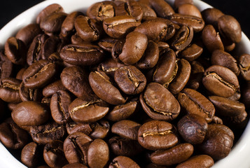 many freshly roasted coffee beans