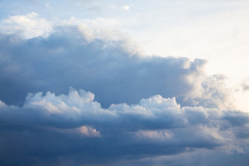 Dark storm clouds illuminated by the sun_