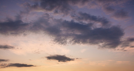 Naklejka na ściany i meble Dark clouds in the evening sky after sunset_