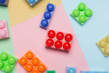 Toy bricks on colorful background. Kid's Plastic Brick For Learning Construction