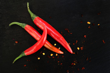 Chili peppers on a dark background