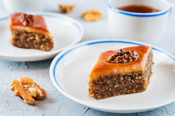 walnut baklava with glasses of tea