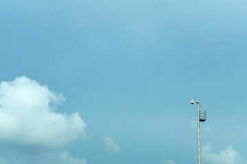 Light Post and cloud with Blue Sky Background
