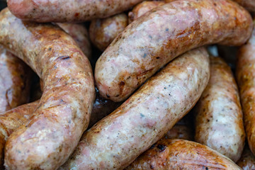 Closeup of sausage on the grill