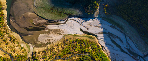 Aerial top-down photo of a dry river bed