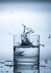 splashing liquid in a glass