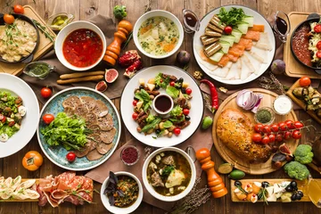 Deurstickers variety of restaurant dishes of national Georgian Armenian and Azerbaijani cuisine © Yulia