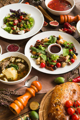 variety of restaurant dishes of national Georgian Armenian and Azerbaijani cuisine