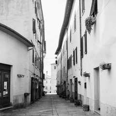 The old narrow streets in the medieval town of Massa Marittima in Tuscany shot with analogue film technique - 3