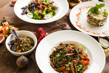 variety of restaurant dishes of national Georgian Armenian and Azerbaijani cuisine