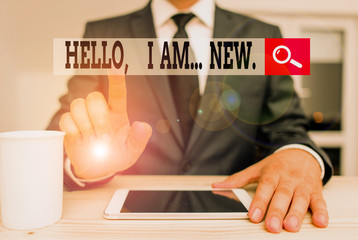 Conceptual hand writing showing Hello I Am New. Concept meaning introducing oneself in a group as...