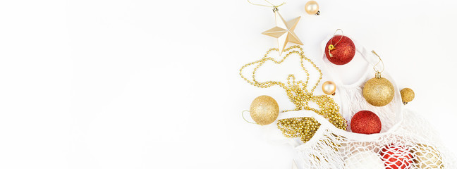 Christmas toys in eco-friendly shopping mesh bag