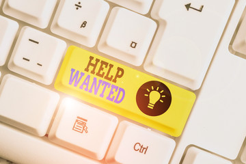 Text sign showing Help Wanted. Business photo showcasing An ad in the paper an employer places to...