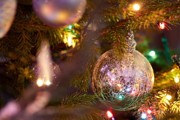 Obraz na płótnie Canvas Christmas tree decoration close-up with blured background