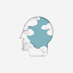 Paper cutout head profile with cloud and blue sky. Positive thinikg and stress management in psychology. 