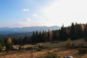 View of the autumn mountains. The village of Bystritsa. Ukraine. Ukrainian Carpathian Mountains.