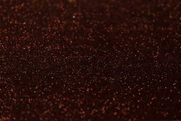 Abstract glitter shining lights background. De-focused lights