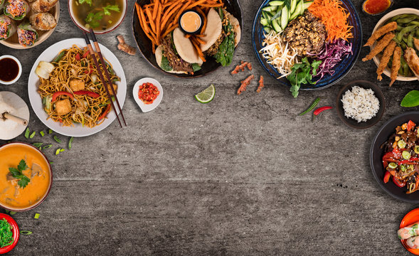 Asian food background with various ingredients on rustic stone background , top view. Vietnam or Thai cuisine.