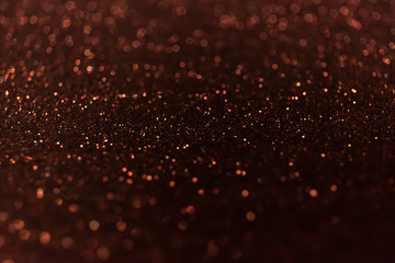 Abstract glitter shining lights background. De-focused lights