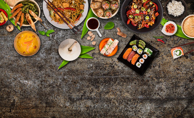 Fototapeta na wymiar Asian food background with various ingredients on rustic stone background , top view. Vietnam or Thai cuisine.