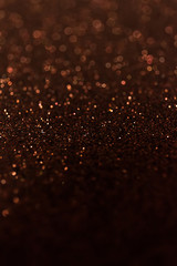 Abstract glitter shining lights background. De-focused lights