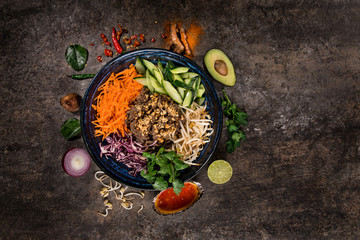Bun bo nam bo asian food background with various ingredients on rustic stone , top view. Vietnam or Thai cuisine.