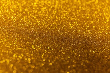 Abstract glitter shining lights background. De-focused lights