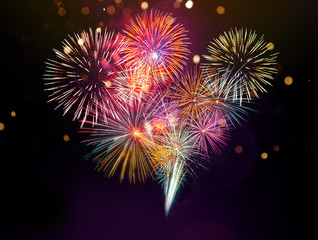 Colorful firework with bokeh background. New Year celebration, Abstract holiday background