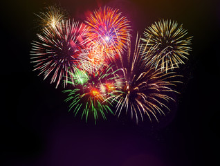 Colorful firework with bokeh background. New Year celebration, Abstract holiday background