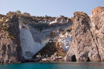 Fototapeta premium Rocks and cliffs in the Mediterranean sea of ​​the island of Ponza, Lazio region, Italy.